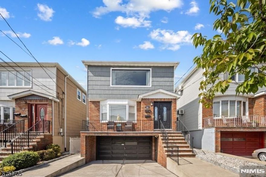 This impressive 2-family home in Kearny offers comfort, space, and modern living. Unit 1 features 3 bedrooms, a stylish updated kitchen, a spacious living/dining area, and gorgeous hardwood floors. Unit 2 offers 3 bedrooms, a modern kitchen, a large living/dining room, 2 full bathrooms, and hardwood floors throughout. The ground-level finished basement includes a recreation area, utility room, and direct access to the attached 2-car garage. Each unit also includes in-unit washer and dryer, plus a private driveway. This is a perfect opportunity for homeowners or investorsâ€”come see it for yourself!