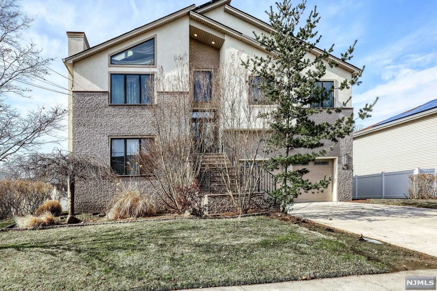 MOVE RIGHT INTO THIS UNIQUE & ELEGANT 5 BRD and 4 BATH CONTEMPROARY HOME LOCATED IN THE BEST RADBURN AREA. AMAZING TWO-STORY ENTRY OPEN SPACE LARGE LIVING ROOM WITH FIREPLACE, DINING RM AND CUSTOM KITCHEN WITH GRANITE COUNTERTOPS HIGH END APPLIANCES and SLIDING DOORS TO A VERY LARGE DECK. 9'-foot CEILING AND HEATED FLOORS. TWO BEDROOMS, BATH and MASTER BEDROOM WITH TWO WALK-IN CLOSETS, MASTER BATH WITH JACUZZI TAB AND DOOR TO THE DECK COMPLETE THIS FLOOR. GROUF FLOOR HAS A FABULOUS FAMILY RM WITH FIREPLACE, TWO BEDROOMS, F/ BATH AND LAUNDRY RM. BASEMENT HAS A GYM/PLAYROOM, BEDROOM AND BATH, A GREAT SAUNA AND OFFICE WITH OUTSIDE ENTRANCE. SOLOR PANELS, GENERATO, 2 CAR GARAGE AND SO MUCH MORE! YOU MUST SEE!