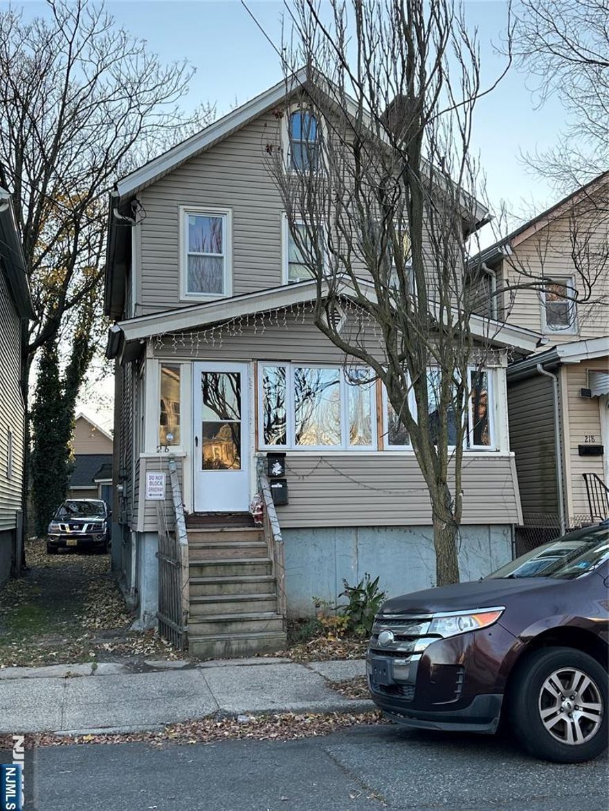 Newly renovated 2 bedroom 1 bathroom open space living room and Kitchen front and rear entrances, Front Porch, close to Transportation, shopping, parks and schools