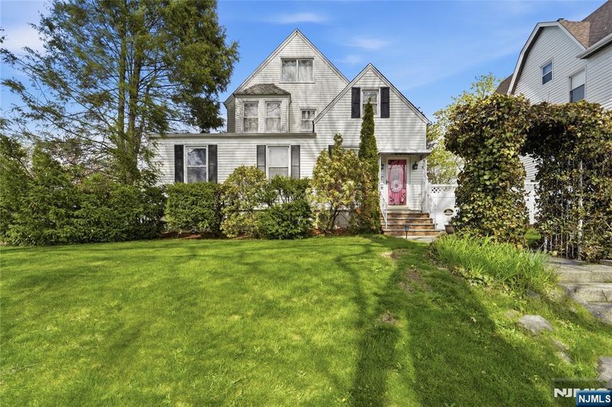 Beautifully maintained 4-bedroom home in the desirable Roosevelt School District, ideally situated on a south-facing corner lot just blocks from schools, shopping, and public transportation. The first floor features an inviting foyer, spacious living room, two office spaces, a den, formal dining room with fireplace, large eat-in kitchen, and a half bath. Upstairs offers three generous bedrooms and a full bath, while the third floor includes a private fourth bedroom and an additional half bath. The finished basement provides a family room with wet bar, full bath, laundry, and ample storage. Enjoy outdoor living with a large patio, built-in fire pit, additional green space, and room for a pool. A long driveway and oversized garage complete this exceptional home.
