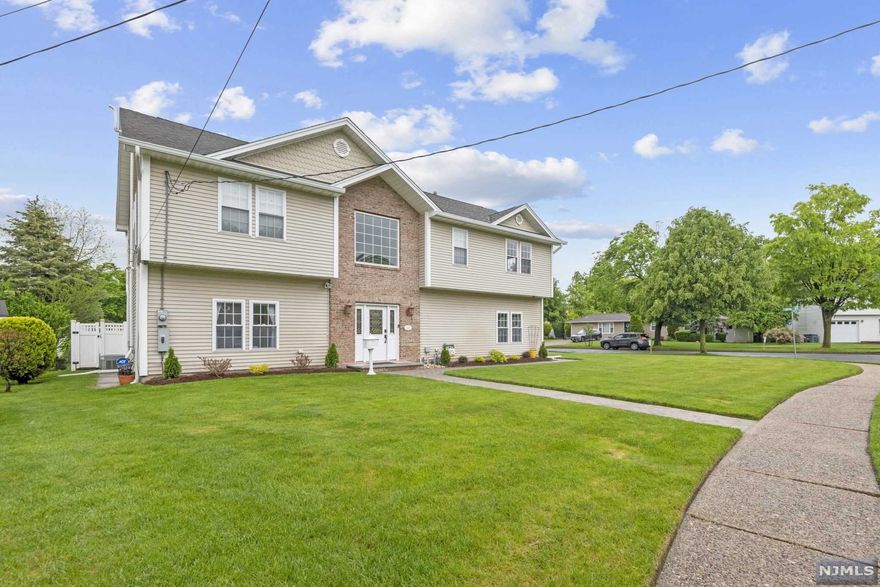 This is the home you have been waiting for! 251 Beech Dr is located in the highly sought-after neighborhood of River Edge. This Bright & Spacious Center Hall Colonial has been meticulously maintained & is move in ready. With 4 bedrooms, 2.5 baths, Beech Dr features hardwood flrs throughout, high ceilings & a floor plan providing excellent flow. The main level is an entertainers dream with a living rm that opens into a formal dining room w/ sliding doors to a paved patio. Enjoy casual dining in the eat-in-kitchen complete with custom cabinetry, granite countertops & SS appliance. Relax in the 2nd-floor main bedroom suite with high ceilings, 2 walk in closets, custom bath, dual vanity & separate shower stall. The 2nd flr is complete w/ 3 add'l well-proportioned bdrms & full 2nd bath. Enjoy the convenience of laundry on the 2nd flr. Professionally landscaped corner lot w/ in-ground sprinklers & fenced backyard. Attached 1 car garage w/ paved driveway for add'l parking