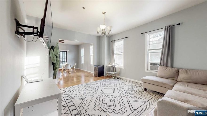 HUGE Corner Three Family Property. This property is not to be missed! Every Room is Large. The first floor consists of a foyer upon entrance with a large storage closet. The first and second floor both have similar layouts consisting of 4 bedrooms, separate living and dining room areas, bathroom, and Eat in Kitchen with large walk-in pantries. Third floor consists of three large bedrooms, bathroom, kitchen semi overlooks the living room. Each unit has beautifully kept hardwood floors, front and back exits, over 20 windows in EACH unit, Central Heat in all units, Fire Sprinkler system throughout the full property.The property comes with 2 detached garages and a full separate Walk out Basement , unfinished but with high 7 ft ceilings