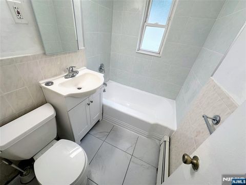 Photo of 533 Grand Ave #A, Leonia, NJ 07605 (MLS # 25033134)
