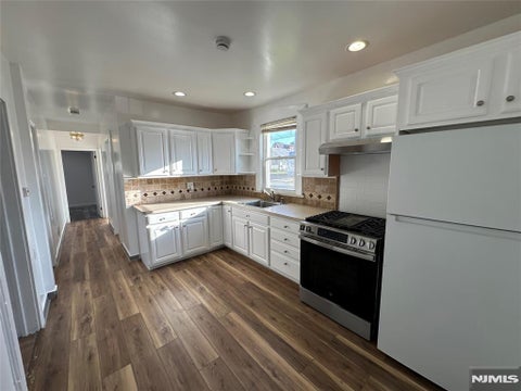 Photo of 79 Belmont Ave #1, Garfield, NJ 07026 (MLS # 26034650)