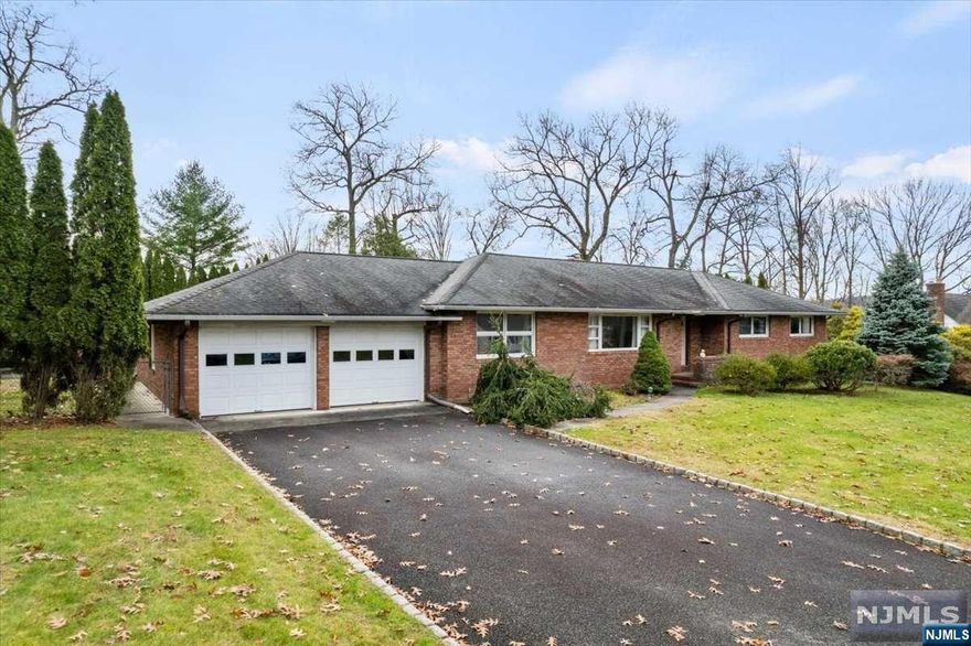 This sprawling well-maintained brick ranch is located in lovely North Haledon. The possibilities are endless! This home offers a spacious eat-in kitchen with an entrance into the family room including a wood-burning fireplace with access to the backyard. Living room, dining room, large full finished basement with wet bar, half bath, and multiple rooms for storage and additional use. A large private backyard with an oversized pool and cabana including a half bath is perfect for entertaining! This home has so much to offer just bring your imagination!