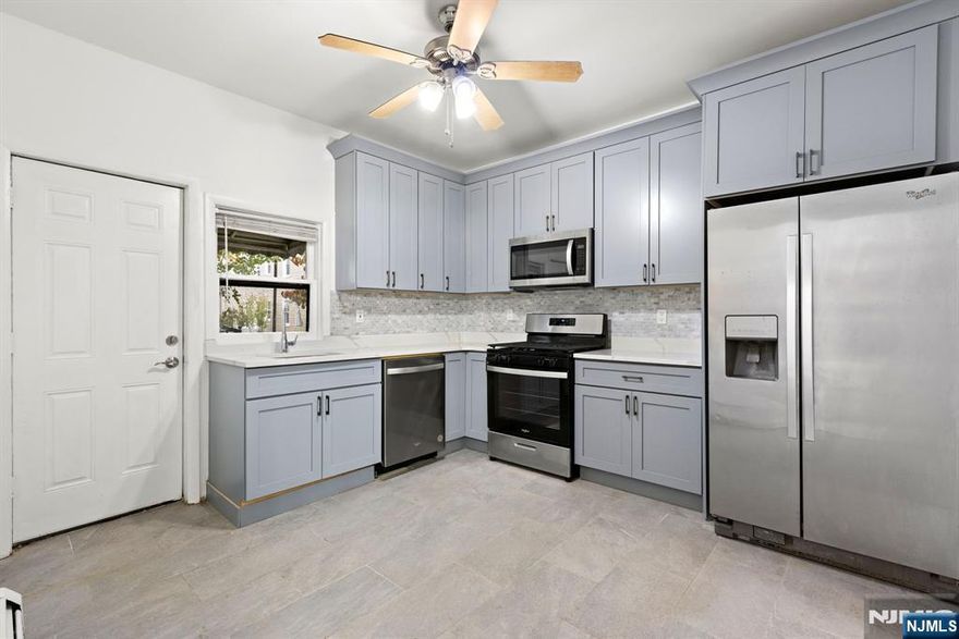 Don't miss this opportunity for an owner-occupant or savvy investor! This 2-family home in an established neighborhood offers immediate income potential. Featuring: Unit 1, a recently renovated 3-bedroom, 1-bath ready for top-market rent & unit 2, a well-maintained 2-bedroom, 1-bath. Live in one unit or rent both for maximum return. Solid bones, also an opportunity to add value through future renovation! Close to transportation, restaurants, and shops nearby.