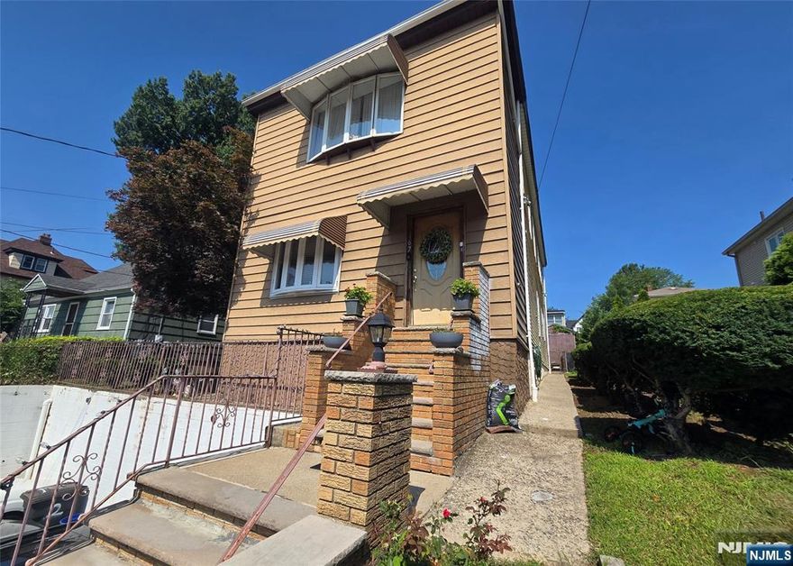 Great Income-Producing Property perfectly situated in the heart of Wood Ridge, on a quiet residential street. Great Location and Easily Accessible to NY transportation! Walking distance to Bus Stop and Train Station. Lots of Windows and Refinished Hardwood Flooring throughout. Updated Bathrooms and Kitchens with Granite Counters and Stainless Steel Appliances. Plenty of Closets throughout plus extra storage in basement. Newer central air condensers and furnaces (2023 and 2021). Washer/Dryer available for each unit in Basement. Extra storage for each tenant and water softener, also in basement. Each unit has their own outdoor space with patio area and a Trex deck (installed 2023). Off-street parking for three cars.