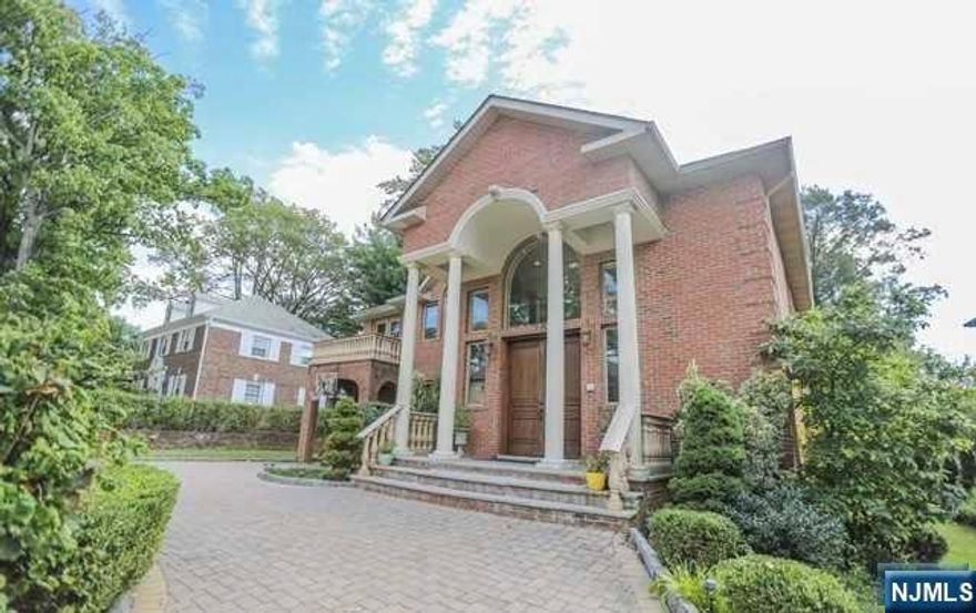 Introducing 76 Euclid Rd, a gorgeous 5 bed / 4.5 bath custom build located in the bluff section of Fort Lee. Feel free to add a pool to this architectural master piece that sits on a rare 12,000 Sqft lot with circular driveway. The interior space spans over 6000 sqft when you include the finish basement highlighted by a home theater, wine cellar, maid room and more. This grand colonial features a double door entry that opens up to a foyer highlighted by marble floors and curved staircase. First floor features a family room, formal living room, formal dining room, powder room, library and more. Your kitchen is a chef's delight featuring, stainless steel appliances, wine chiller, Viking range/griddle and hood, wet bar and more. Travel to the second floor and discover a MASSIVE primary bedroom with fireplace and an exquisite spa-like primary bathroom adorned in marble with radiant floors. Close to bus stop to Manhattan and blue ribbon Elementary School #4. Book your appointment