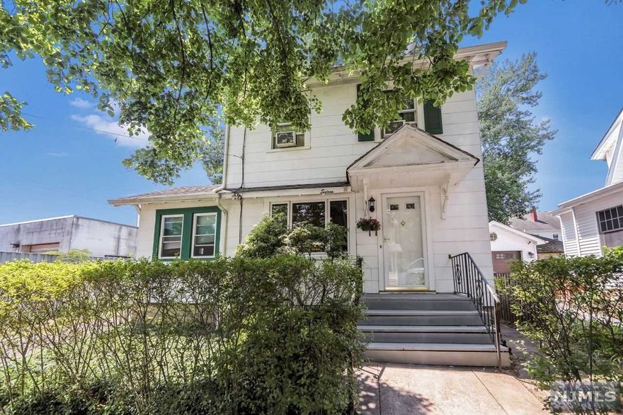 Three Bedroom Colonial Updated kitchen w/granite counters & dining area Living Room & den/bedroom. Second level features three bedrooms and full bath. Walk up attic, gas heat & garage. Close to shopping and school.