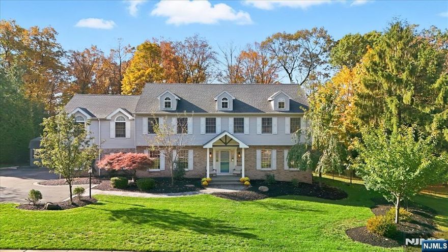 Ideally located on a double cul de sac in one of most sought after areas of North Haledon, this 5 bdrm, 3.5bth offers well over 4,000 Square Feet of living space in an open & spacious layout. The oversized rooms and upgrades throughout truly illuminate a luxury feel. Upon entering the sun-filled Foyer you open to either the Formal Living Rm or the Formal Dining Rm with floor to ceiling windows. The oversized Great Room is anchored by a stunning designer fireplace, the perfect gathering spot for family & friends! The sleek Kitchen includes custom cabinets, stone counters, upgraded appliances and a large pantry. The Sunroom overlooks the composite deck while the Powder Rm & Laundry completes the 1st fl. The 2 fl features 5 large bdrms, including the over 400 SF of Primary Suite with another designer fireplace! The full finished basement is a large open space with so many possibilities including an office and a craft room! 2 car garage and much more! Located in N. Haledon's charming community bordered by Wyckoff and Franklin Lakes, this is one not to miss!