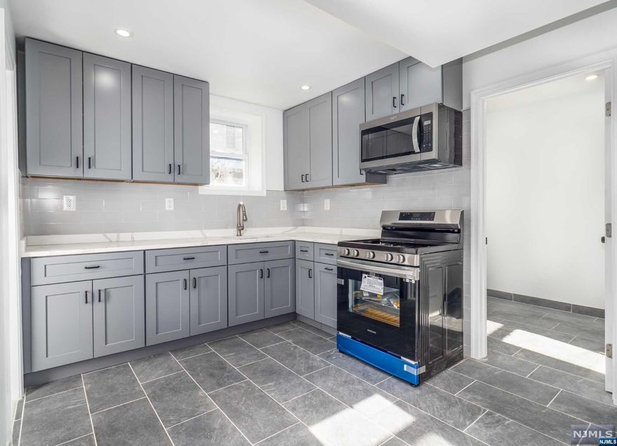 Location, Location and more. This lovely 3 bedroom / 2 full bath single family home is waiting for you. The house has gone through a full renovation. All you will need to do is move in. You will appreciate the fine finishes this home offers, from new wood kitchen cabinet , quartz counter top, new flooring throughout the home, large new beautiful renovated bathrooms, washer and dryer hoop-up conveniently located upstair and also to mention New Plumbing, New Electric , New Heating and AC system and more. You will be amazed at the size of the Garage. There is enough room for an SUV plus more space to do work in. Call and make your appointment.