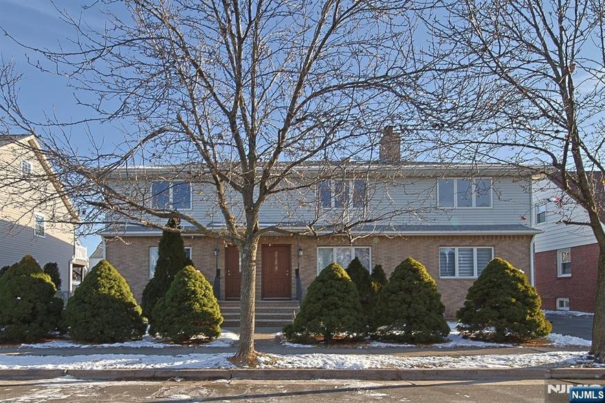 This beautifully upgraded two-family home is located in the heart of Garfield, offering modern living in a prime location. The first-floor unit features a spacious living room, dining room, three bedrooms, two full bathrooms, and a kitchen with stainless steel appliances, quartz countertops, and stylish tiled floors. Additional highlights include hardwood floors, recessed lighting, central AC, and large windows throughout. The fully finished basement includes one room and full bathroom with a separate entrance. The second-floor unit boasts a bright living room, dining room, four bedrooms, two full bathrooms, and an updated kitchen. With its excellent layout and close proximity to local amenities, this property is ideal for both investors and homeowners alike.Turnkey high income producing property, ready for owner occupancy or to rent out.Detached 2car garage with commercial roll up door, spacious driveway can park up to4cars . Close to train station (10min).