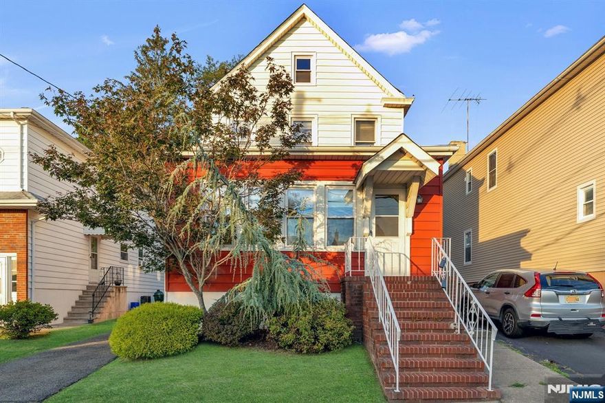 Bright and airy 3 bedroom, 1 1/4 bath classic colonial offering charm and versatility in a prime residential neighborhood. Step into an expansive, heated room, drenched in natural light - perfect as a second living area, office or play room. Inside, enjoy high ceilings, hardwood floors throughout and a freshly painted, move in ready interior. The oversized kitchen provides ample room for cooking and entertaining, while the good size bedrooms offer comfort and privacy. A huge walk up attic, partially finished offers the possibility for expansion and the large basement with high ceilings is ideal to finish for a rec room, gym or workshop. Plus, walk to grade school and NY transportation.