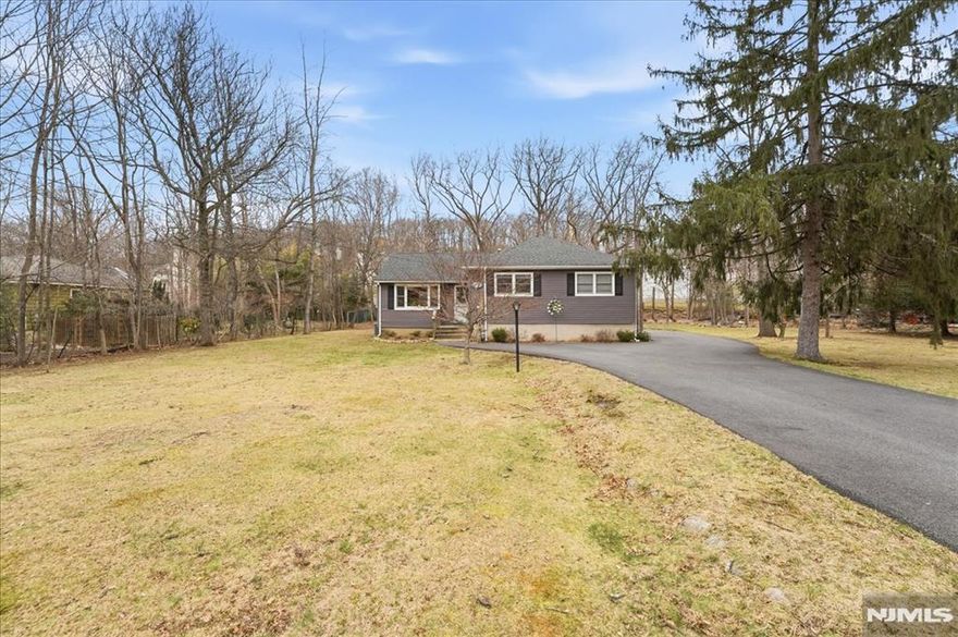 Beautifully maintained ranch-style home set on a generous lot in sought-after Parsippany-Troy Hills. This well-appointed residence offers 3 bedrooms and 2 full bathrooms with a thoughtfully designed layout that balances comfort and functionality. The main level features a sun-filled living room, formal dining area, and seamless flow into the kitchen, creating an ideal setting for both everyday living and entertaining. The partially finished basement adds valuable versatility, perfect for a recreation space, home office, or extended living area. Outdoor space includes a deck and expansive yard, offering a private setting for relaxation or gatherings. Ideally located near major highways, shopping, schools, and transportation, offering a well-balanced lifestyle.