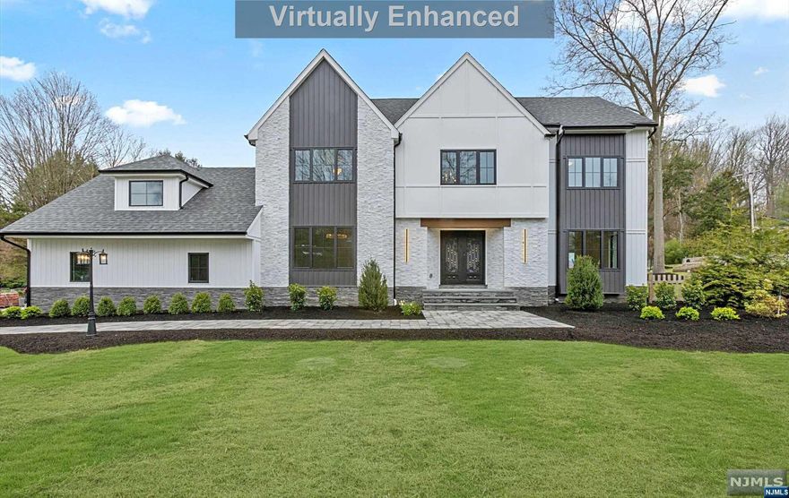 STUNNING 4 BEDROOM 3.5 BATH COLONIAL RENOVATED FROM TOP TO BOTTOM. ONCE A TUDOR STYLE HOME, THIS NEWLY RENVOATED INTERIOR AND EXTERIOR IS EXACTLY WHAT YOU HAVE BEEN WAITING FOR. THE OVERSIZED GOURMET CHEFS EAT IN KITCHEN JUST OFF OF THE FAMILY AND DINING AREA IS THE PERFECT FAMILY SETTING FOR ENTERTAINING. THE SECLUDED HOME OFFICE ABOVE THE GARAGES IS GREAT FOR ALL WHO WORK FROM HOME. ALSO CLOSE TO MAJOR HIGHWAYS FOR COMMUTING AND/OR TRAVEL. OVERSIZED BACKYARD FOR ACTIVITIES OR POOL. WATCH VIDEO TOUR