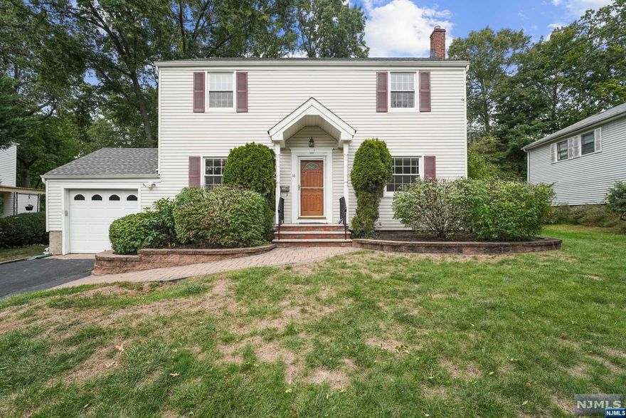 Charmingly updated colonial on a sought-after street featuring 3 bedrooms, 2.5 baths & 1 car garage is ready to welcome you. The finished basement offers more space to grow. The first level hosts the Living room, Eat-in kitchen, formal dining room & powder room. The kitchen is updated with stainless-steel appliances, granite countertops & sliding doors to a fabulous newly painted bid deck overlooking the beautiful private flat yard. The spacious bright living room with one large window & one bay window holds lots of natural light. On the 2nd floor are 3 generously sized bedrooms and an updated bath. The hardwood floors throughout the house and some recessed lights add warmth and richness to the newly painted home's interior. The finished lower level provides a big rec/family room, full bath, laundry room & storage space. The house is conveniently close to Schools, Transportation & Shopping and ready for moving in.