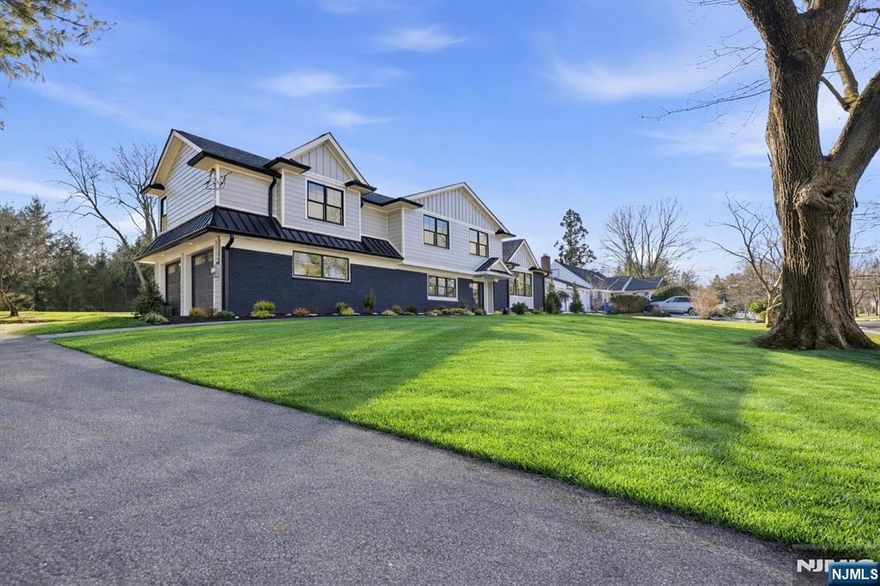 Welcome to Wyckoff! This fully renovated 5-bed, 4-bath home is situated on a 125x200 lot in a highly desirable Wyckoff neighborhood. The home expands 3500+ SF of finished living space (with basement) & is move-in ready. The 1st floor features a formal living room w/ wood burning fireplace, 1 bed & 1 full bath. There is access to the backyard, a custom mudroom area, & attached 2 car garage access. The main level has an open concept living, dining, & kitchen area w/ vaulted ceilings & sliding doors leading out to the backyard. The kitchen has custom cabinets & an oversized island w/ quartz Taj Mahal countertops. The kitchen features GE Cafe Series Appliances, custom hood, & bar w/ wine fridge. Upstairs, youâ€™ll find 3 spacious bedrooms (1 bedroom w/ an ensuite bathroom), hallway bathroom, laundry w/ W/D hookup & the primary suite. The primary suite is spacious w/ 2 WIC options to be built out & an ensuite bathroom w/ double vanity, large shower & soaking tub. The basement is fully finished w/ endless possibilities including additional living area, playroom area, office, etc. There is a fully plumbed room in the finished basement that can be finished to be your 5th full bathroom or additional storage space. The backyard is private & flat, w/c offers endless opportunities. No details were missed on this home including brand new septic (2025), new Anderson windows & doors, new roof, new central A/C & forced hot air (2 zones), new hot water heater, new pavers, & new driveway.