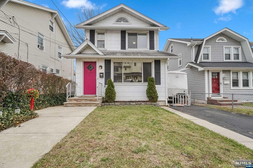 Welcome to 153 Eastern Way located in the heart of Rutherford with views of the NYC skyline! This 3 bed/2.5 bath Colonial sits on a 33'x100' lot & boasts 1,500 sq. ft. of living space. The main floor has a cozy living room w/ hardwood floors, expansive & beautifully updated kitchen (with view of NYC skyline, Tile Floors & GE Profile Appliances) & a powder room. The 2nd floor has a primary bedroom w/ bamboo floors, 2 additional bedrooms & an updated full hall bath w/ stand up shower. Additionally there is a nearly finished attic space (great to make a walk in closet). The basement is finished with a full bath, laundry & storage/utilities room. Location is everything; minutes from NYC & American Dream Mall/Metlife Stadium, close proximity to Dinning, Entertainment & Shopping.