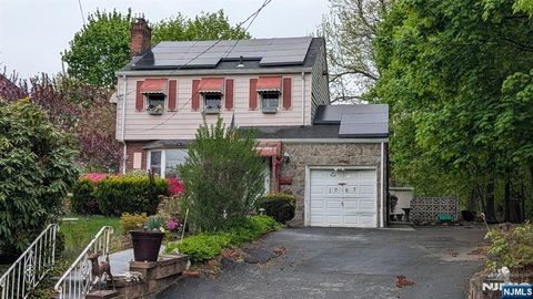 Photo of 1067 Julia Street, Teaneck, NJ 07666 (MLS # 26014209)