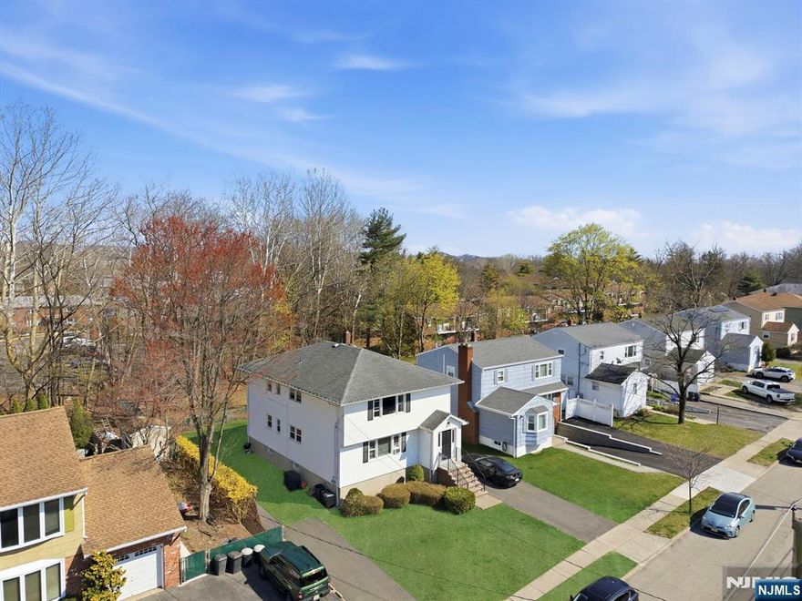 Rarely does an opportunity of this caliber arrive on the market, standing out as the premier two-family investment in town. This property is the definition of "move-in ready," having been renovated to meet the needs of modern living. Each of the two expansive units features a functional and spacious floor plan, offering three generous bedrooms, with full bath & half bath. The heart of each home is the large eat-in kitchen, perfect for both daily meals and entertaining, while oversized windows throughout ensure every room is bathed in an abundance of natural light. This residence offers the ultimate flexibility for savvy buyers, providing an excellent chance to live in one unit while the rental income from the other offsets your costs, or to simply hold the entire building as a high-performing asset with incredible investment upside. Situated in a prime suburban location, the property benefits from a top-rated school district and a vibrant downtown atmosphere. From local boutiques and diverse dining to community events, everything you need is just moments away. Whether you are looking to start your investment journey or expand your portfolio, this turn-key home represents the best value and lifestyle the area has to offer.