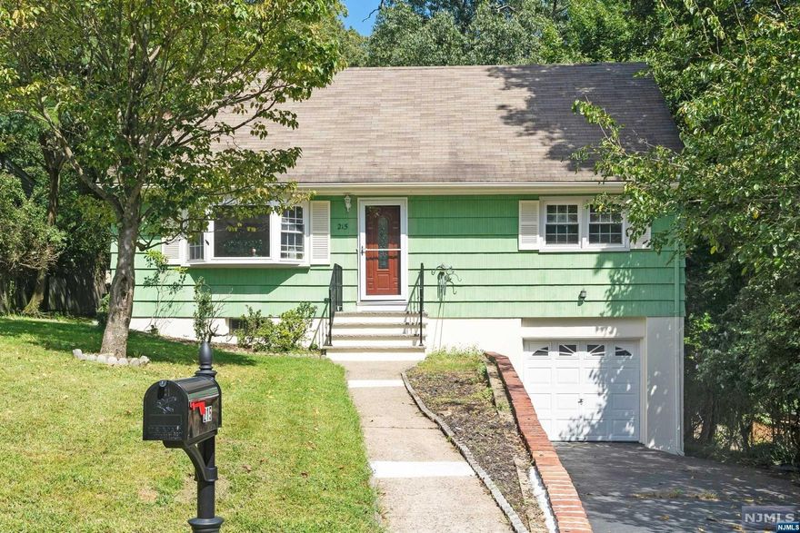 Welcome to this beautiful, affordable & "Turnkey" home, totally renovated Four bedroom Colonial in the "Heights" section of Oakland. Bright with airy open floor plan/ Living and Dining area, Hardwood floor throughout and lots of large windows letting in tons of natural light, a totally renovated modern-eat in kitchen with new custom cabinetry, stainless steel appliances and granite countertops. Totally renovated full bath and two more large bedrooms on main floor. Upstairs leads to another fully renovated full bath and two more bedrooms on either side! Lower Level is partially finished and spacious with doors that lead to garage and backyard! Award winning schools, close to shopping, the great outdoors and to highways Check this out! It won't last!