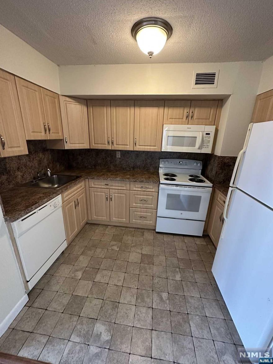 Very spacious 1 bedroom unit in the beautiful Hampshire House -- with a huge balcony and great views! ALL UTILITIES are INCLUDED + 1 PARKING SPACE. Plenty of closet space, large living room. Washer/dryer on every floor in hallway. 24 hr doorman, exercise room, outdoor pool.