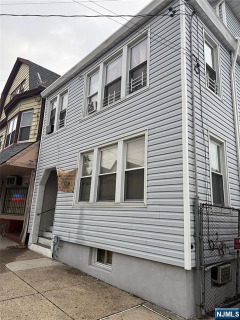 Photo of 495 21st Avenue, Paterson, NJ 07513 (MLS # 25043403)