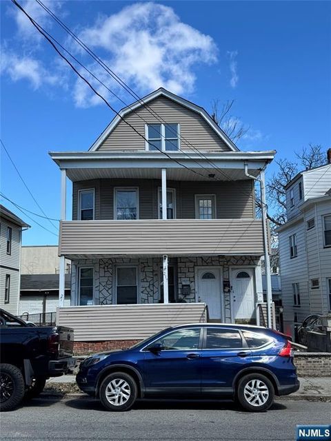 Photo of 219 Lawrence Place, Paterson, NJ 07501 (MLS # 26010358)