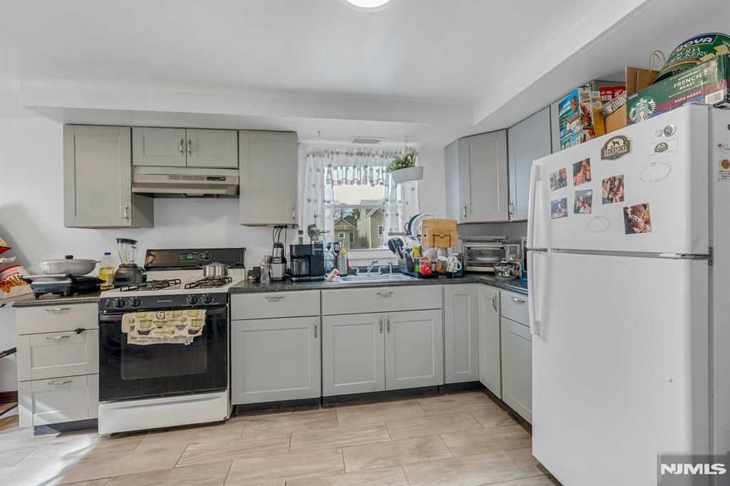 Photo of 13 Allen Street, Passaic, NJ 07055 (MLS # 26002490)