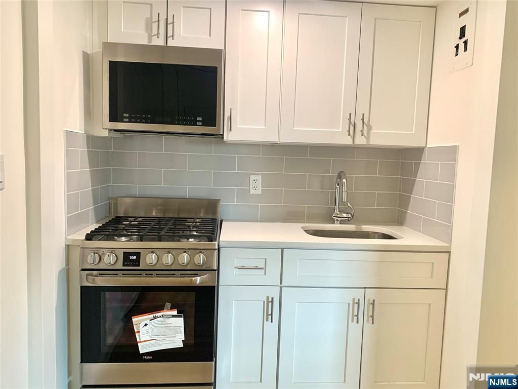 Photo of 501 Linwood Drive #4, Fort Lee, NJ 07024 (MLS # 26011988)