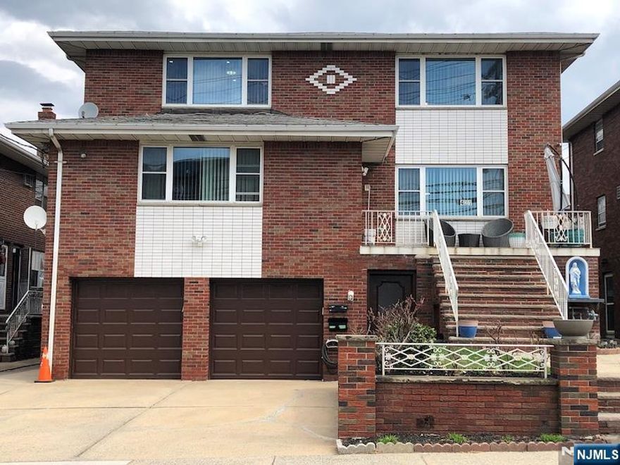 Totally renovated(2026) 2 family house 2nd floor 2 brs & 1 fbth unit!Facing south very bright w/street & tree view!Entrance w/new tiles & new carpet on steps to 2nd floor!Open & spacious layout for good entertaining!Beautifully refinished hardwood floors throughout!Entrance foyer w/big w-i closet!Huge living room w/new recessed lights!Big dining room w/modern designer light fixture!Brand new modern eat-in kitchen w/fan & new cabinets & backsplash & new seamless sink & faucet & new hood and new ss refrigerator & newer stove(GE) & dishwasher(samsung) and big pantry!1st bedroom w/2 ample size closet & closet light!2nd bedroom w/w-i closet!Full bathroom w/linen closet & 2 sinks new vanity & new faucet and new toilet & new lighting!!All new blinds & light fixtures & door handle & outlet cover!Every room has wall AC unit!1 car garage(right side)plus driveway parking space included!Next to window washer/dryer is only for 2nd floor tenant use!Tenant is responsible for snow removal!Very close to 158 bus stop on north Ave for easy commuting to NY!Very convenient location for easy access to school(elementary & middle) & park & restaurants too!