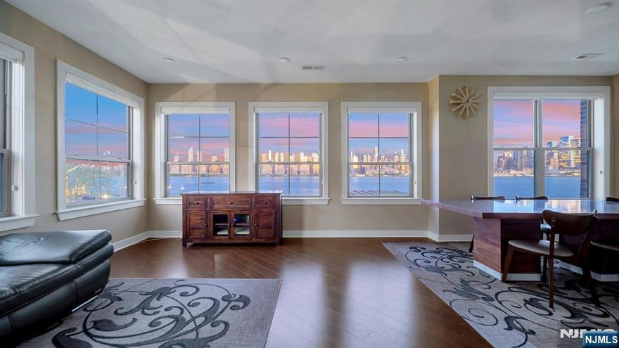 Welcome to luxury waterfront living at Port Imperial, located along New Jerseyâ€™s prestigious Gold Coast! This stunning condominium offers unparalleled, unobstructed views of the Hudson River and the iconic NYC skyline, directly across from Hudson Yards. Spanning approximately 1,500 square feet, this beautifully renovated home features 3 spacious bedrooms and 2 full bathrooms. Renovated just a few years ago, it showcases modern finishes throughout, including recessed lighting, wood flooring, and custom built-in closets for optimal storage. The sleek open-concept kitchen is equipped with an induction cooktop, perfect for the contemporary chef. Both bathrooms are outfitted with heated floors, adding a touch of spa-like comfort. Residents enjoy access to a full suite of resort-style amenities, including a 24-hour concierge, state-of-the-art fitness center, indoor basketball court, tennis courts, outdoor pool, hot tub, and a business centerâ€”all designed to elevate your lifestyle. Commuting is a breeze with the NYC ferry and bus service just steps away. Plus, youâ€™re minutes from an array of local shops, restaurants, and waterfront parks, making this the perfect balance of luxury, convenience, and vibrant city living. Schedule a tour 917-502-4112.
