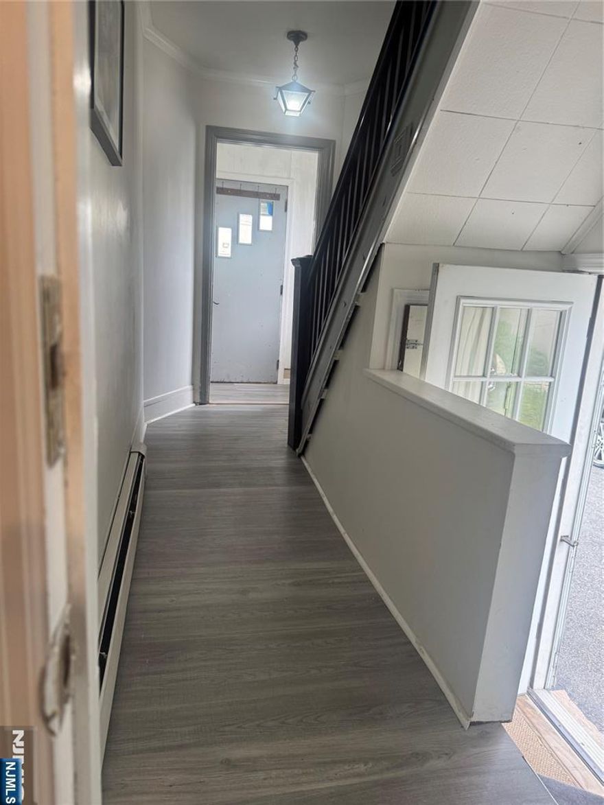 Welcome to this stunning renovated 2bed 1bath apt. This 1st floor unit features stainless steel appliances, quartz countertops. laundry room, parking space, and alkaline water system for your convenience. Conveniently located near major highways and public transportation ! used of yard with notice. (NO pets)