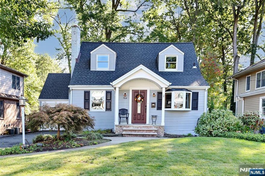 A great opportunity to make this 4BR 3 bath Cape Cod home your own in one of the best locations in River Edge. A gem for buyers who want to take on some very manageable updates or those who want to build their dream house in the 50 x 150 lot. A solid home with a great floor plan that is so easy to work with. Want ideas?? Just check out the neighborhood! Charming curb appeal (younger roof 2018). When you enter, a handsome portico leads to a foyer and spacious living room, which flows into a bright eat-in kitchen with a side entrance to the yard. Both bedrooms on the first floor are generously sized and thereâ€™s a full bathroom. Upstairs, the full rear dormer includes two additional bedrooms; the primary bedroom has a walk-in closet and shares a Jack and Jill bathroom with the fourth bedroom. The finished basement has excellent extended family potential with an egress window, bathroom with shower stall and kitchenette area -- room for another bedroom or a fantastic Family Room. Full walk out to the patio w/ fire pit and park like yard. Leave your car behind for all 3 schools, train and bus to NYC. This home is one of the coveted properties that borders Memorial Park. Check out the floor plan in listing and bring your HTV ideas. This home is offered STRICTLY â€œAS ISâ€ WITH NO CREDITS FOR REPAIRS. The surrounding values are there, and you just have to see the location to fully appreciate it. Per floor plan 1536 sq feet Basement 736 sq feet