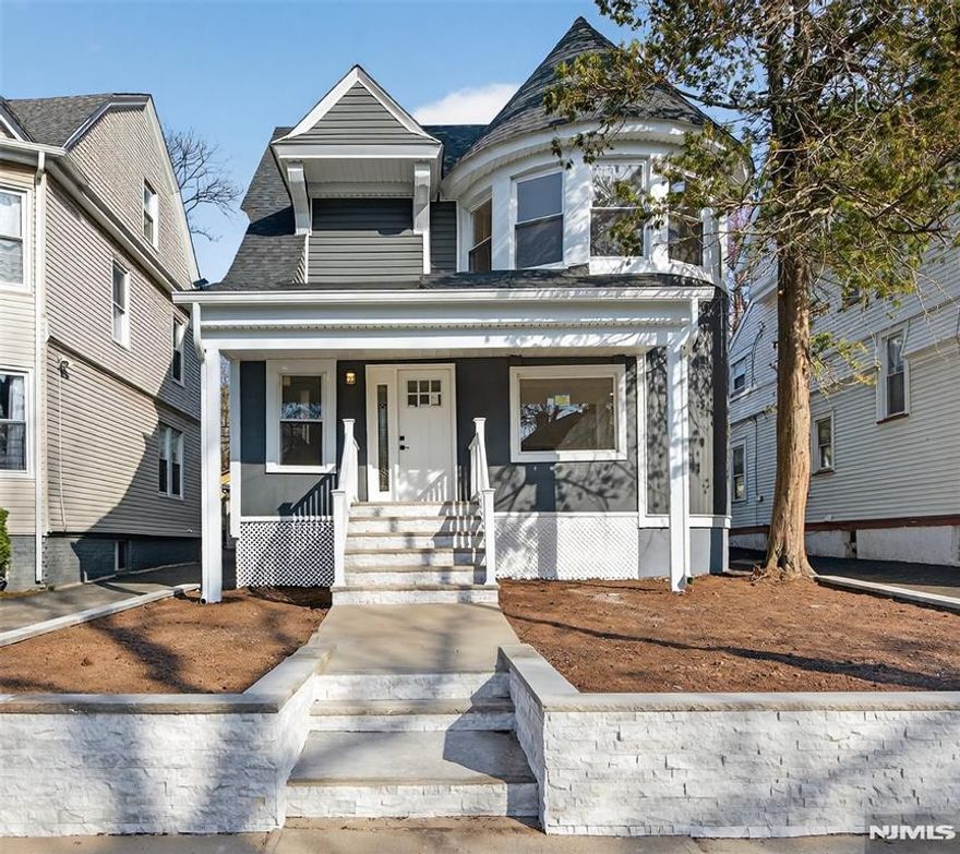 Welcome to this beautifully renovated home nestled in a quiet and desirable section of East Orange. Fully remodeled inside and out, this expansive residence offers the perfect blend of modern elegance and comfortable living. Featuring 5 generously sized bedrooms and 3 full bathrooms, the home provides ample space for both everyday living and effortless entertaining. The stunning kitchen serves as the centerpiece, showcasing quartz countertops, a marble backsplash, and elegant gold finishes that create a sophisticated, upscale ambiance. Fully equipped with stainless steel appliances, it delivers both style and functionality. Each bedroom offers oversized closets, ensuring abundant storage, while the abundance of windows throughout fills the home with natural light, creating a bright and inviting atmosphere. The partially finished basement offers endless possibilities perfect for an entertainment space or the media room. In addition, this home has been completely updated with brand-new electrical, roof, siding, mechanical systems, plumbing, fixtures, appliances, and more providing peace of mind and a truly turnkey experience. This move-in-ready property truly has it all space, style, and modern upgrades making it the perfect place to call home.