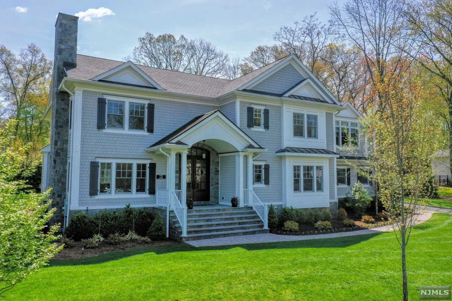 Spectacular Home in Wyckoff!! This is the home that has it all. Situated in the most desirable section of Sicomac, this 5-year young home is perfection with an amazing layout on all 3 floors, high-end products and workmanship throughout.The grand 2-story Foyer with raised panels and coffered ceiling sets the stage for this beauty including the banquet sized dining room, luxurious Living Room, inviting family that opens to the Gourmet Kitchen. The High-end Kitchen includes a bar, Pantry and Butler's Pantry. The first floor also has a guest suite/office w/full bath. The deluxe Primary suite is a dream with the gas FPL, Marble bathroom and custom closets. Enjoy all the basement has to offer - gym, recreational area, tavern-sized bar and custom wine room. The park-like backyard is lush, flat and private and has a great patio w/built-in fire pit. There is a 3-car attached garage, plus a 2-car detached garage, too! Not a detail was missed - Too much to list! Add'l features list avail.