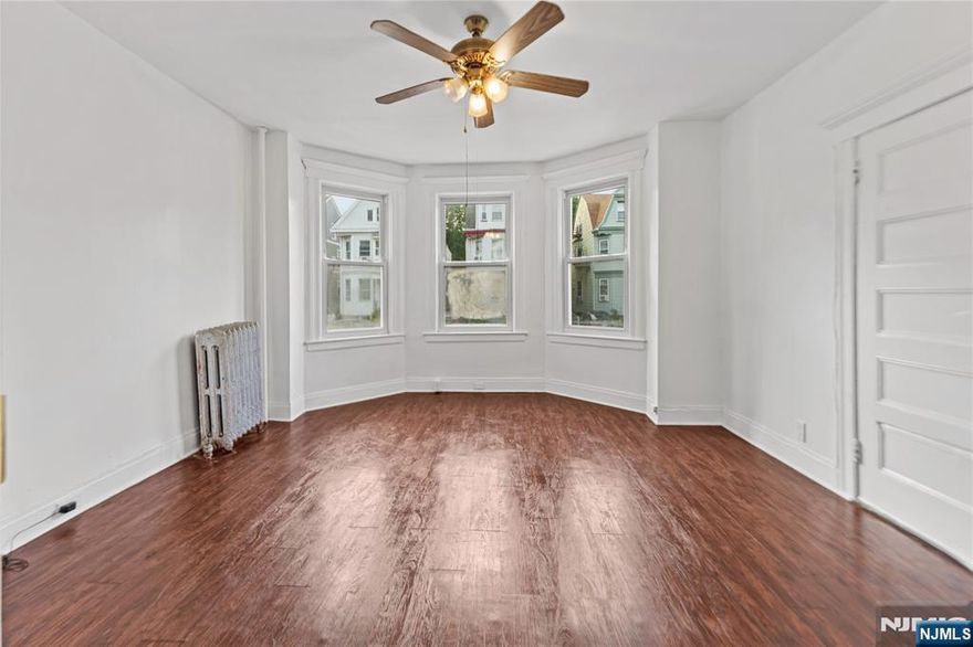 Welcome to your newly renovated 3-bedroom apartment, designed for modern living with convenience in mind. This stunning apartment features brand-new stainless steel appliances in the kitchen, providing a sleek and contemporary cooking experience. Freshly painted walls create a bright and inviting atmosphere throughout. Enjoy the ease of commuting with close proximity to NYC transportation and major highways, making your daily travels hassle-free. The apartment includes the added benefit of off-street parking, ensuring a secure spot for your vehicle. Additionally, residents have shared access to a charming backyard, perfect for relaxation or outdoor gatherings. This apartment combines stylish updates, practical amenities, and an ideal location for the ultimate living experience. Schedule an appointment today to see all that this home has to offer!