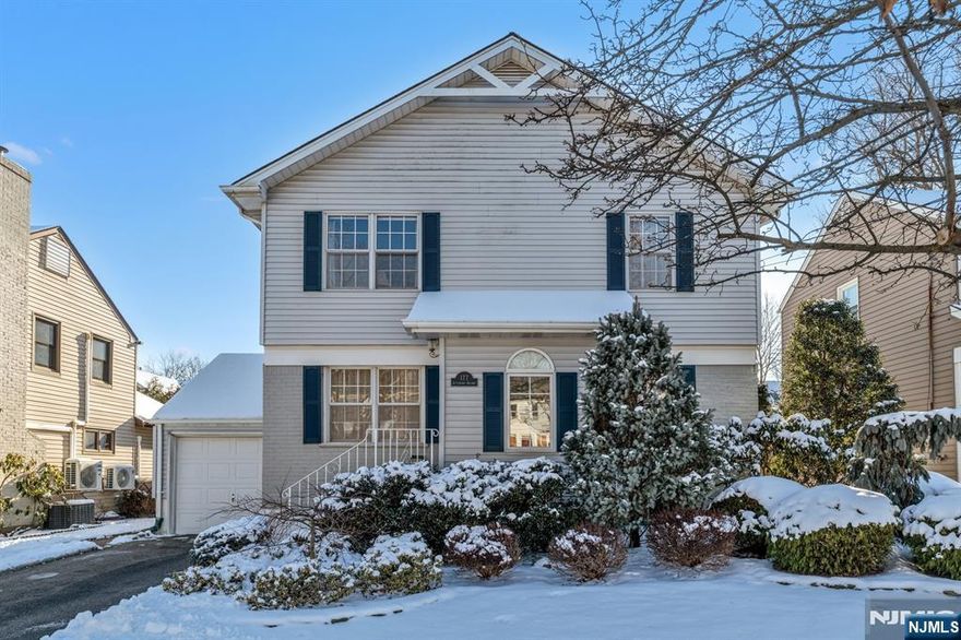 Welcome to this charming Colonial in River Edge, beautifully maintained and featuring a generous addition at the rear of the home. The classic layout greets you with a formal living room and dining room on either side of the foyer. Continue through to the family room and expansive kitchen, complete with a center island and cozy breakfast nook. A convenient half bath and laundry room are located off the kitchen. The kitchen opens up to a massive Trex deck, perfect for entertaining or relaxing, and overlooks a private backyard surrounded by mature arborvitae trees, offering your very own secluded retreat. Upstairs, youâ€™ll find three bedrooms and two full baths, including a spacious primary suite with a luxurious bathroom featuring a soaking tub and separate shower. This home truly captures the best of River Edge living, with top-rated schools, a quick commute to NYC, and a welcoming community that youâ€™ll love to call home.