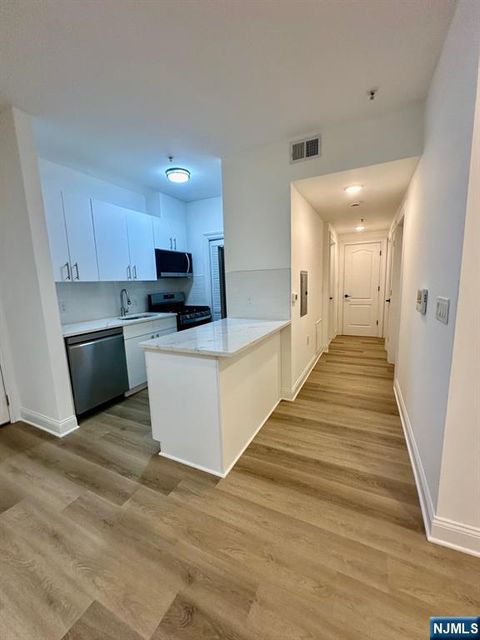 Photo of 5 Monitor St #202, Jersey City, NJ 07304 (MLS # 26005315)