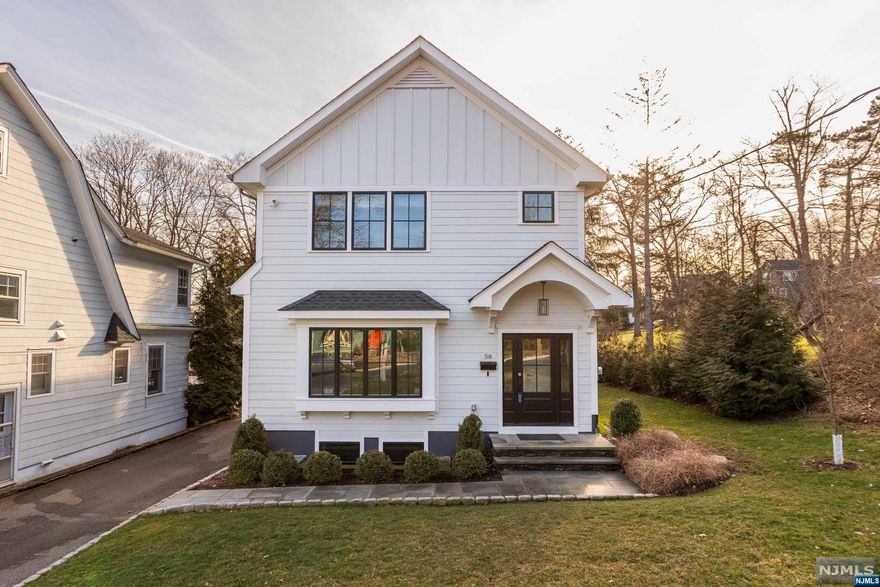 Welcome to your dream home! Built in 2019, this 5 bedroom, 4.1 bath residence offers the perfect blend of modern luxury & classic charm. An open layout designed for entertaining, this home features a formal DR & kitchen adorned w/ custom cabinetry, SS appliances, quartzite countertops, & granite composite sink. Step inside to find red oak floors throughout the 1st & 2nd floors, adding warmth & elegance. The spacious living area opens to a beautiful outdoor Trex deck, perfect for enjoying your morning coffee or hosting summer gatherings. The finished basement boasts tile floors & 10' ceilings, w/ several windows to let plenty of natural light in. It includes a bedroom suite, office, and playroom/gym, ideal as an Au Pair suite, for guests, or creating a space that suits your lifestyle. Upstairs, the primary bedroom is a retreat w/ an ensuite bath featuring 2 sinks, providing convenience & luxury.