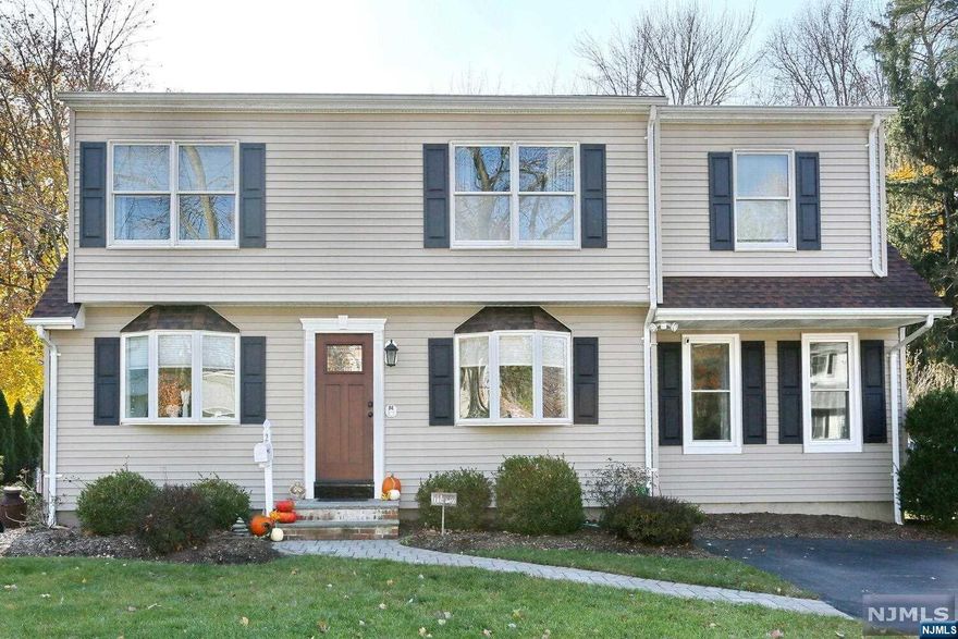 Discover the perfect home in this charming 5-bedroom, 2-bath expanded Cape Cod. The first floor boasts a living room, modern kitchen with granite counters and stainless appliances, a cozy family room with fireplace and a dining room with convenient deck access. Additionally, there are 2 bedrooms and a full bath on this level. Upstairs, you'll find an expansive primary bedroom, 2 more bedrooms, an office and a large full bath. The full, partially finished basement offers additional play/work space plus laundry facilities and ample storage. This fenced, corner property provides a fantastic outdoor space for entertaining and play, complemented by 2 sheds for extra storage. Hardwood floors and central air add to the home's appeal. Located in the sought after town of Waldwick, this property is close to schools, transportation, shopping and all the amenities the area has to offer. Don't miss the opportunity to see this wonderful home in person - schedule your visit today!