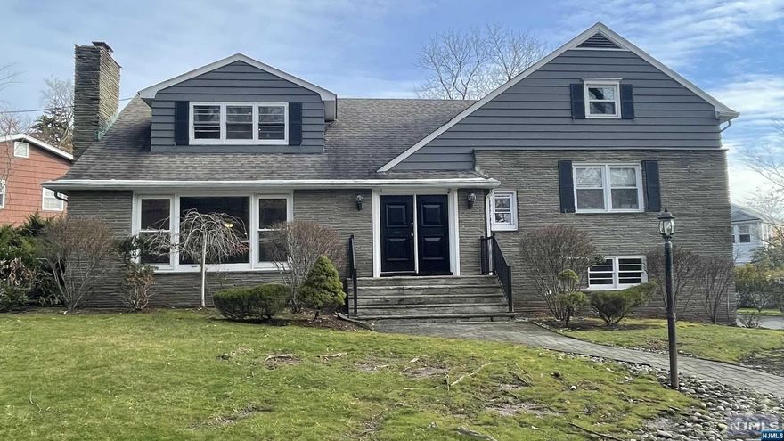 Welcome to your new and spacious split-level home nestled in the hills with easy access to all major highways and more. Large rooms throughout with open floor plan. Enter through the foyer and the first level boasts a living room, dining room, large eat-in kitchen, bath and access to the sunroom. The next level boasts bedrooms and a spa-like bathroom retreat with rain shower heads in the jacuzzi tub and shower. The primary bedroom has a bath with shower. The designer's closet is a retreat in itself. The full finished basement offers a fourth bedroom currently used as a wine room and ample space for games or TV. Move right in and start the 2023 in your new home.