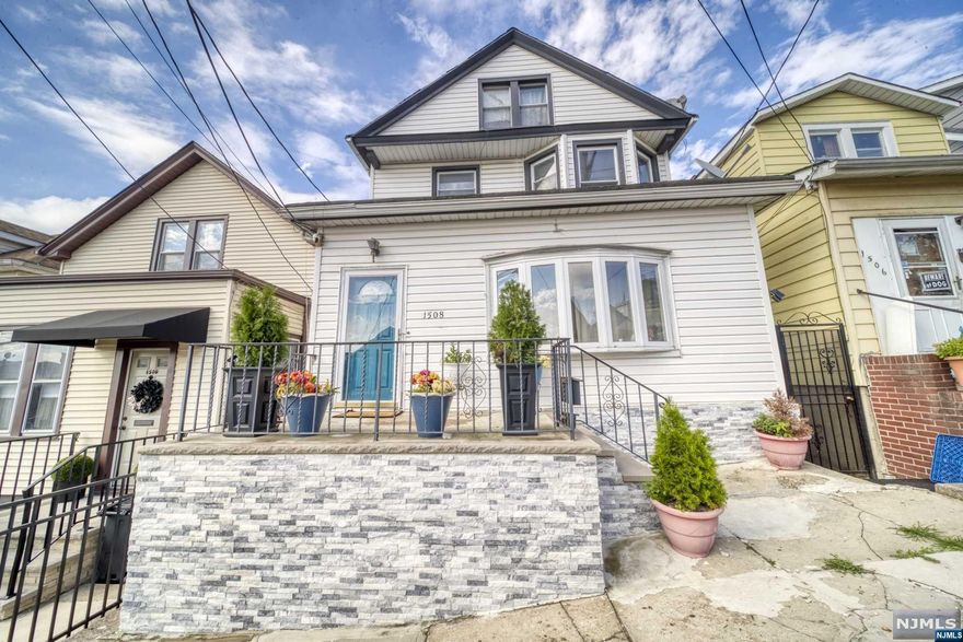 Beautiful side hall colonial with hardwood floors, updated kitchen with SS appliances and granite countertop. open concept to dining room. Off the kitchen there is a deck overlooking beautiful garden with above ground pool. Full finished basement with summer kitchen and exterior entrance, ideal for extended family or mother/daughter. In addition there is also a bonus room on the 3rd floor with lots of storage.