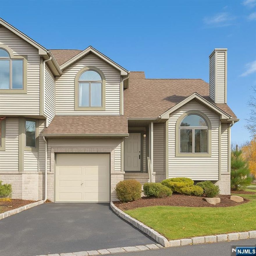 Bright and well-maintained 3-bedroom plus den, 3.5-bath, private corner, semi-attached townhouse located in a desirable Norwood community. This home features a welcoming two-story entryway leading into a spacious living and dining area with hardwood floors, abundant natural light, and easy access to a private outdoor area that faces a wooded forest, offering a quiet, serene space. The functional kitchen provides ample cabinet space and a convenient layout. The upper level includes well-sized bedrooms with vaulted ceilings, including a primary suite with generous closet space and an ensuite bath. A versatile den offers flexible use as an office, guest space, or playroom. Additional highlights include in-unit laundry and central air. The HOA provides excellent amenities including an outdoor pool, clubhouse, tennis courts, playground, landscaping, and snow removal. The community offers ample resident and guest parking and is conveniently located near shopping, parks, major highways, and transportation. Situated in the highly regarded and top-rated Northern Valley school district.