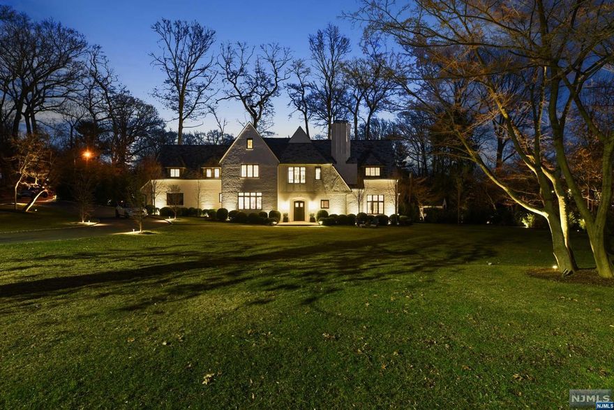 oven Wolf range, Sub-Zero fridge, custom appliance cabinet, & doors open to garden. Don't miss hidden pantry! PR and mudrm (w/access to garage) & tons of storage complete this level. On 2nd flr you'll find primary BR suite, 3 add'l BRs all with their own ensuite baths & full laundry rm. 3rd flr houses add'l BR, full bath and den. On lower level there's a media room for watching movies, powder rm, wine rm w/ seating & more storage.