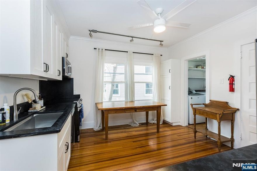 Renovated 2 bedroom 1st floor apartment in the Walnut Street section of Montclair! This gem offers a perfect blend of modern comfort and classic charm. Perks such as central air conditioning,in unit washer and dryer, off street parking providing peace of mind and convenience. The heart of this home is the spacious eat-in kitchen, with ample counter space, stainless steel appliances, and a large pantry for all your storage needs. Both bedrooms offer cozy retreats, perfect for unwinding after a long day, while the well-appointed bathroom boasts modern fixtures and finishes. The living area is bathed in natural light, with a bonus 3 season sunroom. Enjoy easy access to the town's farmers market, vibrant dining, shopping, and NYC transportation. Whether you're strolling through nearby parks or exploring local boutiques, this location offers the best of suburban living with urban conveniences. Don't miss your chance to call this meticulously renovated unit your new home sweet home!