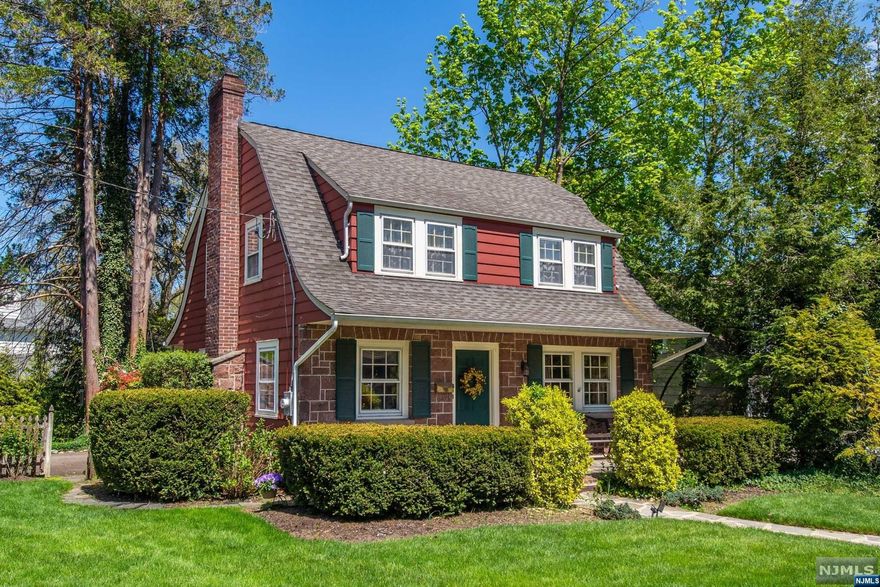 Welcome to 3 Eton Pl, nestled within the illustrious enclave of Glen Rock. Gracing a prime location in the esteemed Glen Rock, this home boasts an inviting living room complete with a traditional woodburning fireplace, a luminous dining room bathed in natural light, powder room, and a contemporary kitchen. The second floor reveals three large bedrooms, alongside a full bathroom. Partially finished basement, transformed into a familial retreat, complete with a convenient laundry room, a one-car attached garage, complemented by ample space to comfortably park four additional vehicles. Embrace the outdoors on the sprawling oversized lot, where a magnificent patio seamlessly blends with a large deck, encompassing both front and back yards for your own slice of heaven. Central AC, hardwood flooring, and plenty of room for the opportunity to expand! Enjoy the proximity to major highways, great schools,and easy NYC transit, rendering this residence a great opportunity in one of Glen Rock