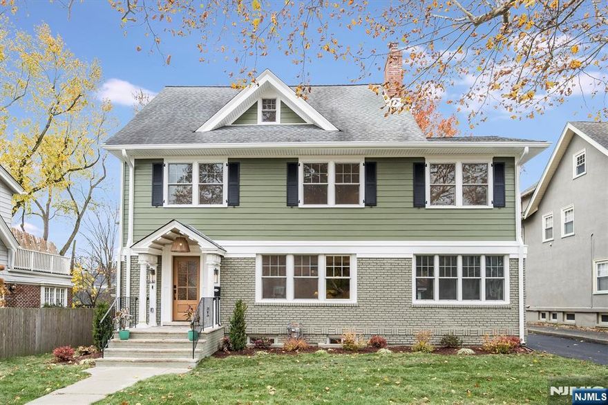 Fully renovated colonial offering the perfect blend of timeless style and modern luxury. This reimagined home features designer finishes, custom millwork, and an open concept floor plan ideal for today's lifestyle. The chef's kitchen is a showstopper w/ a large quartz island, custom cabinetry, Dacor stainless appliances- including double wall ovens and 6 burner gas range,pot filler and hood- plus a built-in coffee station. The kitchen opens seamlessly to a spacious great room with a gas fireplace and sliders to a new deck and level, fenced yard perfect for relaxing or entertaining. The prime location can't be beat- just steps to Watchung Plaza, with NYC Midtown direct train, boutiques, coffee shops and restaurants.Close to Brookdale Park with playgrounds, dog parks, rose garden, tennis and pickle ball courts, summer concerts and more! All systems are new- plumbing, electric, hvac, roof, windows and siding. Featuring 7 bedrooms, with 1 bedroom plus ensuite bath on first floor, 4 bedrooms, 3 full baths plus laundry room on the second floor and 2 bedrooms plus full bath on third. The primary suite impresses with vaulted ceiling, gracious closet, luxurious bath with dual vanity, soaking tub, oversized shower and heated floor. Balcony of the primary with views out to the backyard. Special touches include arched doorways, coffered ceilings, bar area with wine fridge, home office and wallpapered powder rm. 120 Beverly is the perfect opportunity to enjoy all Montclair has to offer!