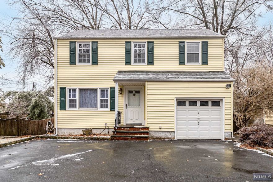 Look no further! Spacious 4 Bed 1.5 Bath Colonial with 1 Car Garage is the perfect place to settle & call home. Situated on a prime corner lot in a great neighborhood, you're close to shopping, dining, schools, NYC bus stops & so much more! The main lvl features a large Living rm & elegant FormalDining rm with HW flrs, decorative molding & plenty of natural light throughout. Sizable Eat-in-Kitchen offers ample cabinet storage & Dinette space, customize it to your liking! Convenient 1/2 Bath, too! Upstairs, the main Full Bath, along with 4 generously sized Bedrooms. Full Basement with Laundry & storage adds to the package - finish it off for even MORE living space! Big Backyard with Patio is completely fenced-in for your privacy. 1 Car Garage, dbl wide drive, the list goes on! Don't wait! Come & see TODAY!