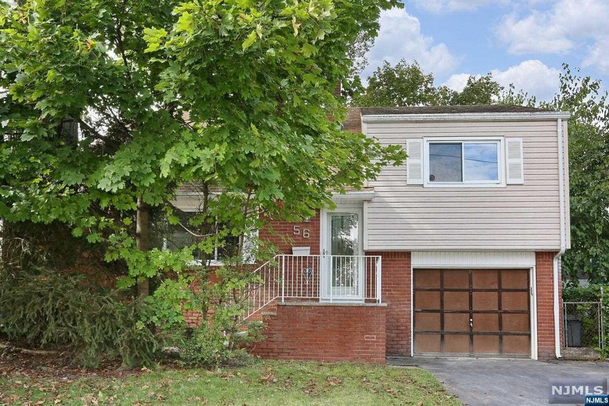 Split level home on quiet street! Freshly painted! Living room, dining room, modern kitchen with stainless steel appliances, convenient half bath and garage entry. Upstairs master bedroom with updated 1/2 bath, 2 more good size bedrooms and full bath. Basement is finished with dry bar, laundry, plenty of storage and water proofed with French Drains. Fully fenced secluded yard with patio. Gas heat, central air conditioning plus units in bedrooms, new Pella front & back doors with screens and storms, one car attached garage with auto opener, floored storage attic w/stairs access. Maintenance free brick and vinyl exterior. Great location close to schools, transportation & playground!